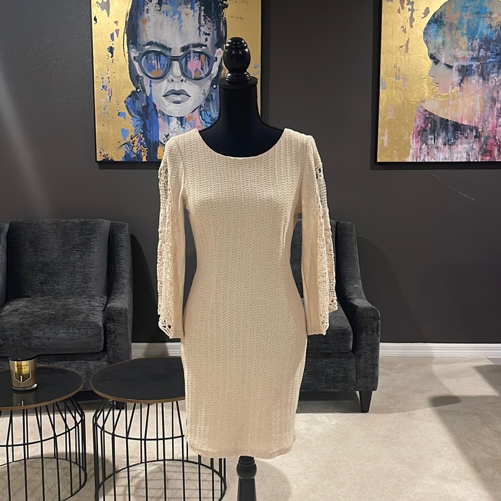 Knit dress with embroidered detailed sleeves